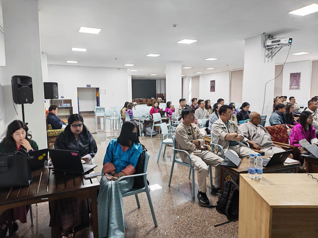 Participants seated with laptops during the IPMS training