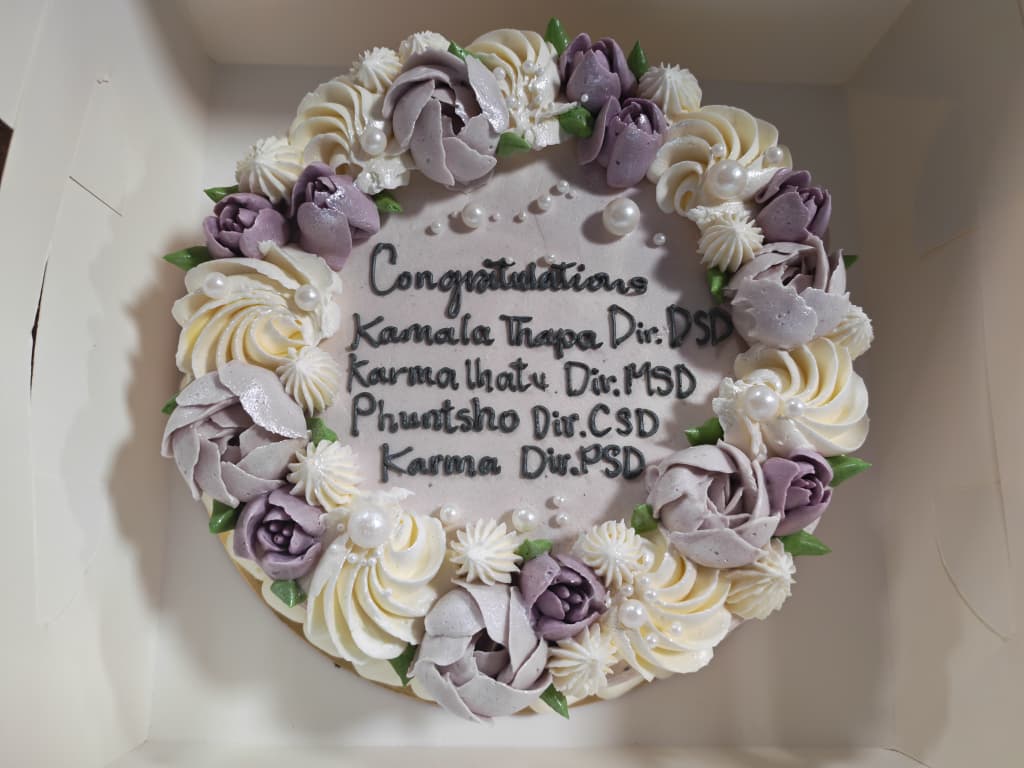 Congratulations cake for the four newly appointed directors